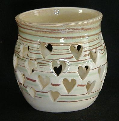 Hearts around candle cup (day)